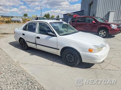Czwarte zdjęcie samochodu z boku: 2001 CHEVROLET GEO PRIZM BASE VIN:1Y1SK528X1Z428430 - miniatura