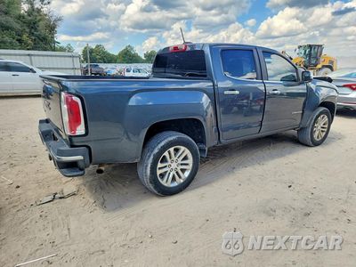 Trzecie zdjęcie samochodu z tyłu: 2015 GMC CANYON SLT VIN:1GTG5CE36F1232058 - miniatura