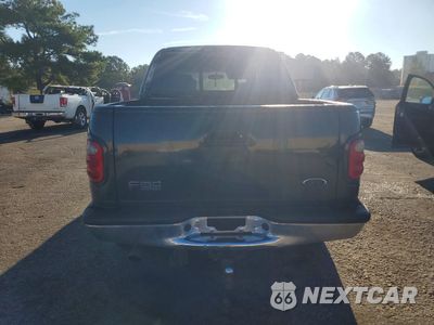 Zdjęcie 6 z 12 samochodu: 2001 FORD F150 SUPERCREW VIN:1FTRW08L71KF52539 - miniatura