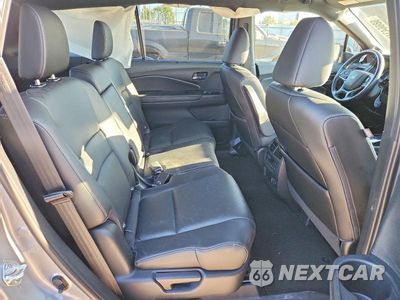 Zdjęcie 10 z 12 samochodu: 2021 HONDA PASSPORT TOURING VIN:5FNYF8H98MB023214 - miniatura