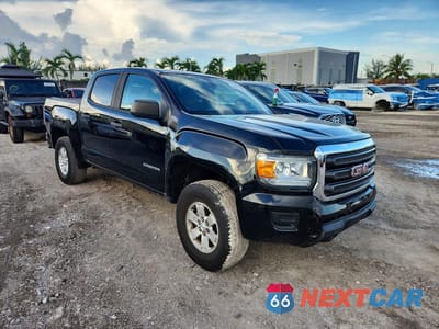 Czwarte zdjęcie samochodu z boku: 2018 GMC CANYON VIN:1GTG5BEA1J1199830 - miniatura