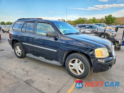 Czwarte zdjęcie samochodu z boku: 2007 GMC ENVOY VIN:1GKDT13S672139726 - miniatura