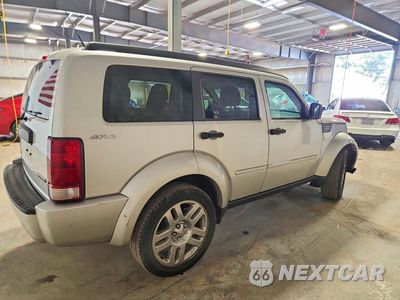Trzecie zdjęcie samochodu z tyłu: 2011 DODGE NITRO HEAT VIN:1D4PU4GK1BW517585 - miniatura