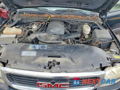 Zdjęcie 12 z 14 samochodu: 2003 GMC YUKON XL K1500 VIN:1GKFK16Z83J104626 - miniatura