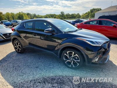 Czwarte zdjęcie samochodu z boku: 2021 TOYOTA C-HR XLE VIN:JTNKHMBX3M1111298 - miniatura