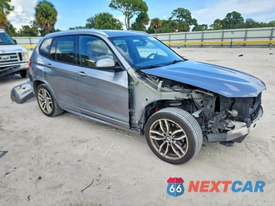 Czwarte zdjęcie samochodu z boku: 2016 BMW X3 SDRIVE28I VIN:5UXWZ7C58G0T42613 - miniatura