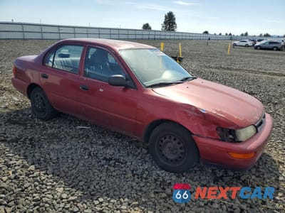 Czwarte zdjęcie samochodu z boku: 1994 TOYOTA COROLLA BASE VIN:JT2AE04B2R0085981 - miniatura