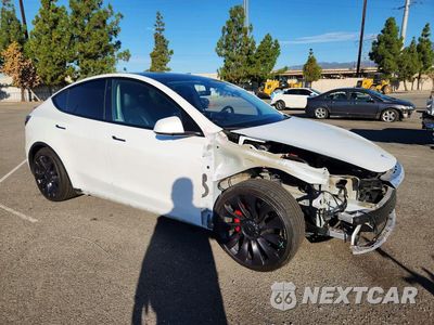 Czwarte zdjęcie samochodu z boku: 2021 TESLA MODEL Y VIN:5YJYGDEF3MF240086 - miniatura