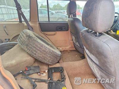 Zdjęcie 11 z 13 samochodu: 2001 JEEP CHEROKEE SPORT VIN:1J4FF48SX1L602680 - miniatura