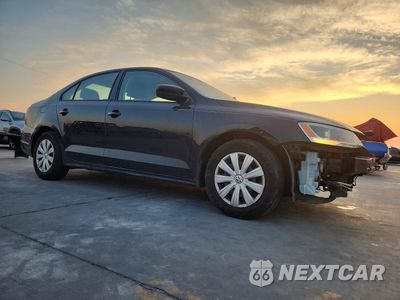 Czwarte zdjęcie samochodu z boku: 2014 VOLKSWAGEN JETTA BASE VIN:3VW2K7AJ1EM438787 - miniatura