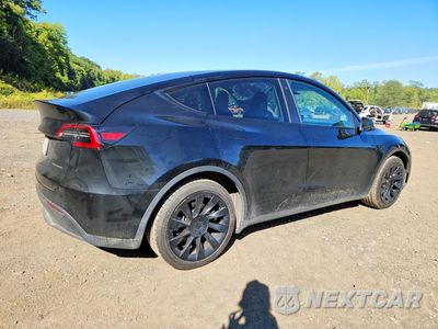 Trzecie zdjęcie samochodu z tyłu: 2023 TESLA MODEL Y VIN:7SAYGDEE3PF613397 - miniatura