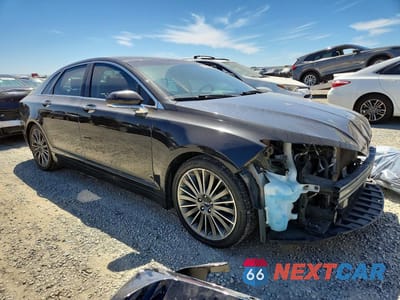 Czwarte zdjęcie samochodu z boku: 2015 LINCOLN MKZ HYBRID VIN:3LN6L2LU8FR627786 - miniatura