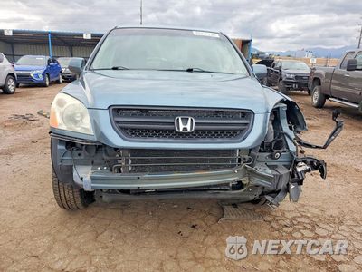 Piąte zdjęcie samochodu w środku: 2005 HONDA PILOT EX VIN:2HKYF18435H542427 - miniatura