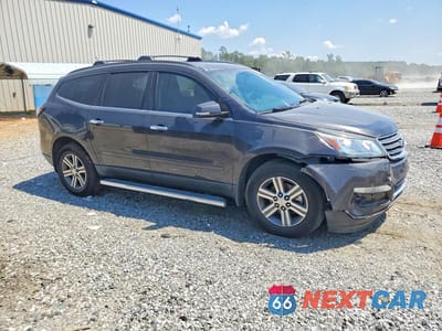 Czwarte zdjęcie samochodu z boku: 2017 CHEVROLET TRAVERSE LT VIN:1GNKRGKD9HJ188151 - miniatura