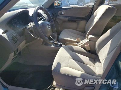 Zdjęcie 7 z 12 samochodu: 2001 MAZDA PROTEGE DX VIN:JM1BJ222810440405 - miniatura