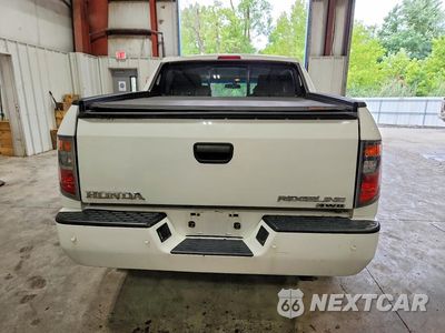 Zdjęcie 6 z 12 samochodu: 2006 HONDA RIDGELINE RT VIN:2HJYK16216H533017 - miniatura