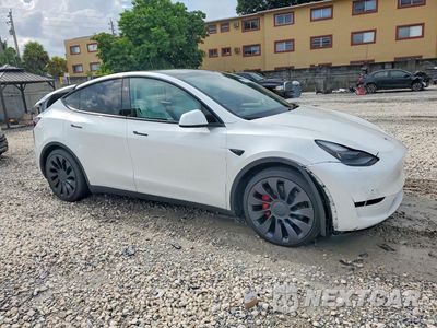 Czwarte zdjęcie samochodu z boku: 2024 TESLA MODEL Y VIN:7SAYGDEFXRF061084 - miniatura