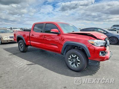 Czwarte zdjęcie samochodu z boku: 2021 TOYOTA TACOMA TRD OFF-ROAD VIN:3TMDZ5BN6MM118134 - miniatura