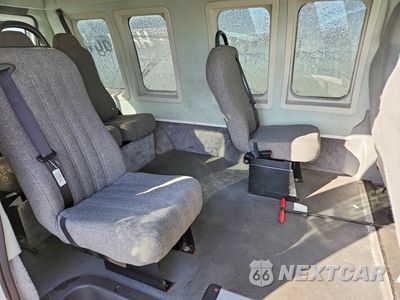 Zdjęcie 11 z 14 samochodu: 2009 FORD ECONOLINE E150 VAN VIN:1FTNE14W29DA89362 - miniatura