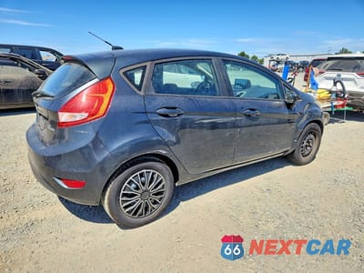 Trzecie zdjęcie samochodu z tyłu: 2011 FORD FIESTA SE VIN:3FADP4EJ4BM189618 - miniatura