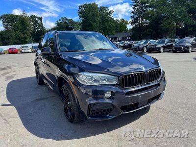 Czwarte zdjęcie samochodu z boku: 2018 BMW X5 XDRIVE50I MSPT VIN:5UXKR6C51J0U14610 - miniatura