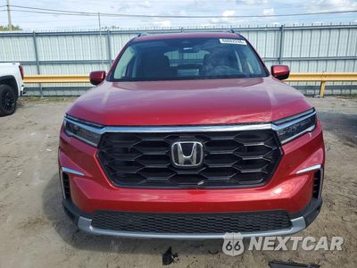 Piąte zdjęcie samochodu w środku: 2025 HONDA PILOT TOURING VIN:5FNYG1H77SB165120 - miniatura