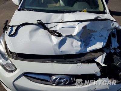 Zdjęcie 11 z 12 samochodu: 2014 HYUNDAI ACCENT GLS VIN:KMHCT4AE7EU694266 - miniatura