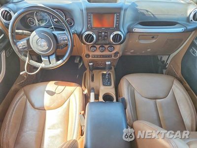 Zdjęcie 8 z 14 samochodu: 2017 JEEP WRANGLER UNLIMITED SAHARA VIN:1C4HJWEG5HL605716 - miniatura