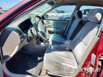 Zdjęcie 7 z 12 samochodu: 1999 TOYOTA COROLLA VE VIN:1NXBR12E7XZ154104 - miniatura