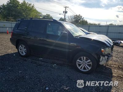 Czwarte zdjęcie samochodu z boku: 2006 TOYOTA HIGHLANDER HYBRID VIN:JTEEW21A460002586 - miniatura