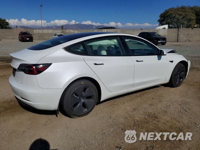 Trzecie zdjęcie samochodu z tyłu: 2023 TESLA MODEL 3 VIN:5YJ3E1EA1PF554178 - miniatura