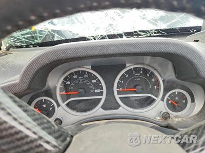 Zdjęcie 9 z 12 samochodu: 2008 JEEP WRANGLER UNLIMITED SAHARA VIN:1J4GA59178L512637 - miniatura