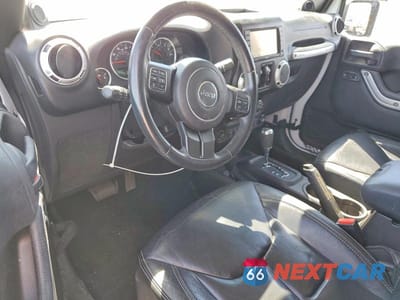 Zdjęcie 8 z 13 samochodu: 2013 JEEP WRANGLER UNLIMITED SAHARA VIN:1C4BJWEG0DL647257 - miniatura