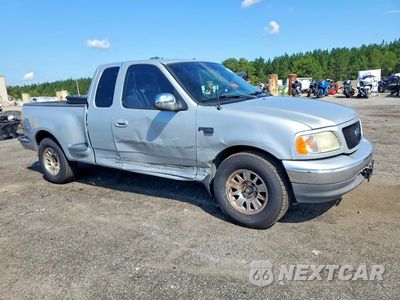 Czwarte zdjęcie samochodu z boku: 2003 FORD F150 VIN:1FTRX07W83KC67473 - miniatura