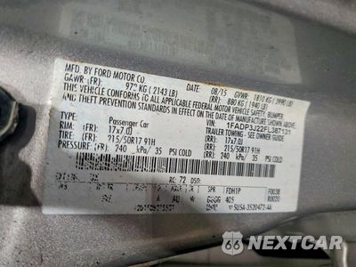 Zdjęcie 12 z 12 samochodu: 2015 FORD FOCUS TITANIUM VIN:1FADP3J22FL387131 - miniatura