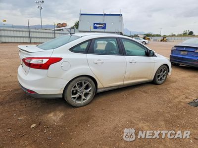 Trzecie zdjęcie samochodu z tyłu: 2014 FORD FOCUS SE VIN:1FADP3F23EL111273 - miniatura