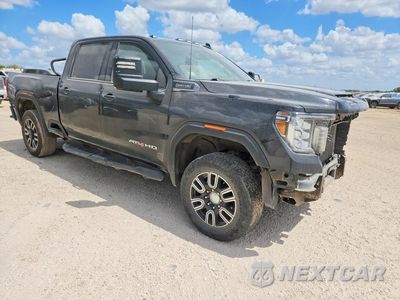 Czwarte zdjęcie samochodu z boku: 2020 GMC SIERRA K2500 AT4 VIN:1GT49PE71LF306213 - miniatura