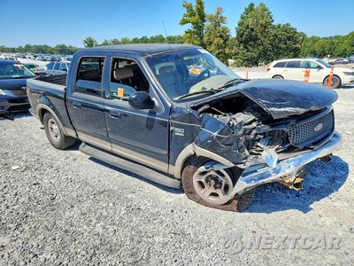 Czwarte zdjęcie samochodu z boku: 2001 FORD F150 SUPERCREW VIN:1FTRW07L11KC16001 - miniatura