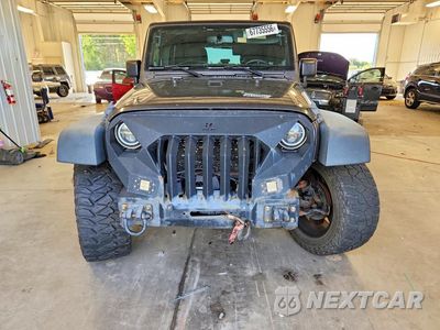 Piąte zdjęcie samochodu w środku: 2014 JEEP WRANGLER UNLIMITED SPORT VIN:1C4BJWDG1EL289363 - miniatura