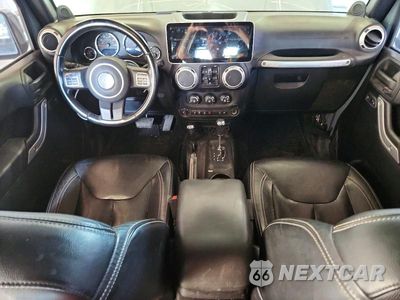 Zdjęcie 8 z 13 samochodu: 2014 JEEP WRANGLER UNLIMITED SAHARA VIN:1C4BJWEG7EL272923 - miniatura