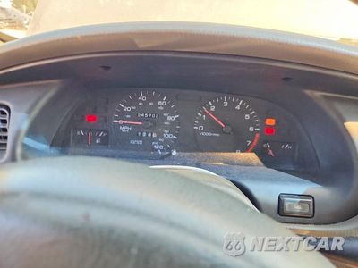 Zdjęcie 9 z 13 samochodu: 1999 NISSAN ALTIMA XE VIN:1N4DL01D4XC120019 - miniatura