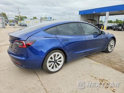 Trzecie zdjęcie samochodu z tyłu: 2021 TESLA MODEL 3 VIN:5YJ3E1EB2MF057175 - miniatura