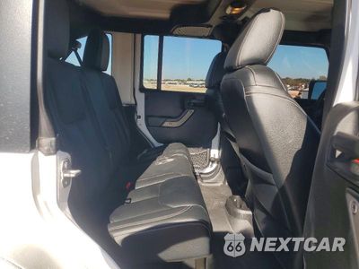 Zdjęcie 10 z 12 samochodu: 2015 JEEP WRANGLER UNLIMITED SPORT VIN:1C4BJWDG0FL666170 - miniatura