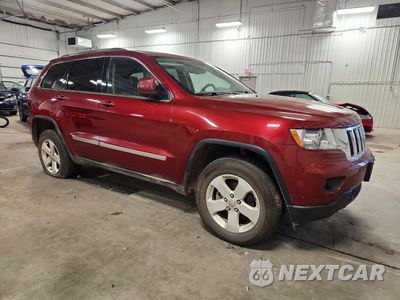 Czwarte zdjęcie samochodu z boku: 2012 JEEP GRAND CHEROKEE LAREDO VIN:1C4RJFAG7CC273295 - miniatura