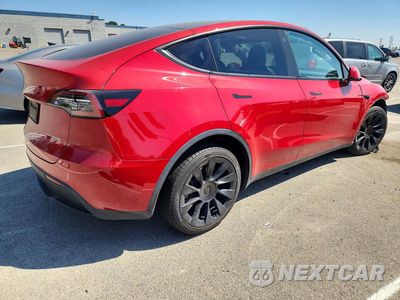 Trzecie zdjęcie samochodu z tyłu: 2023 TESLA MODEL Y VIN:7SAYGDEE9PA076340 - miniatura