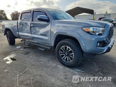 Czwarte zdjęcie samochodu z boku: 2021 TOYOTA TACOMA TRD SPORT VIN:3TYBZ5DN6MT000402 - miniatura