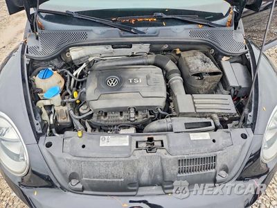 Zdjęcie 11 z 12 samochodu: 2014 VOLKSWAGEN BEETLE VIN:3VWF17AT8EM639463 - miniatura