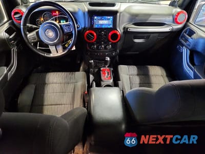 Zdjęcie 8 z 12 samochodu: 2012 JEEP WRANGLER UNLIMITED SAHARA VIN:1C4BJWEG9CL134538 - miniatura