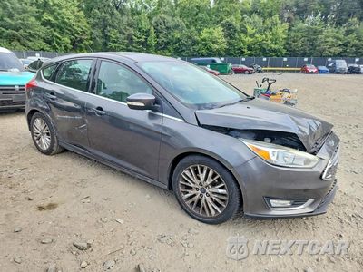 Czwarte zdjęcie samochodu z boku: 2016 FORD FOCUS TITANIUM VIN:1FADP3N25GL400756 - miniatura