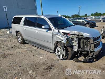 Czwarte zdjęcie samochodu z boku: 2016 CHEVROLET SUBURBAN LT VIN:1GNSKHKC3GR127069 - miniatura